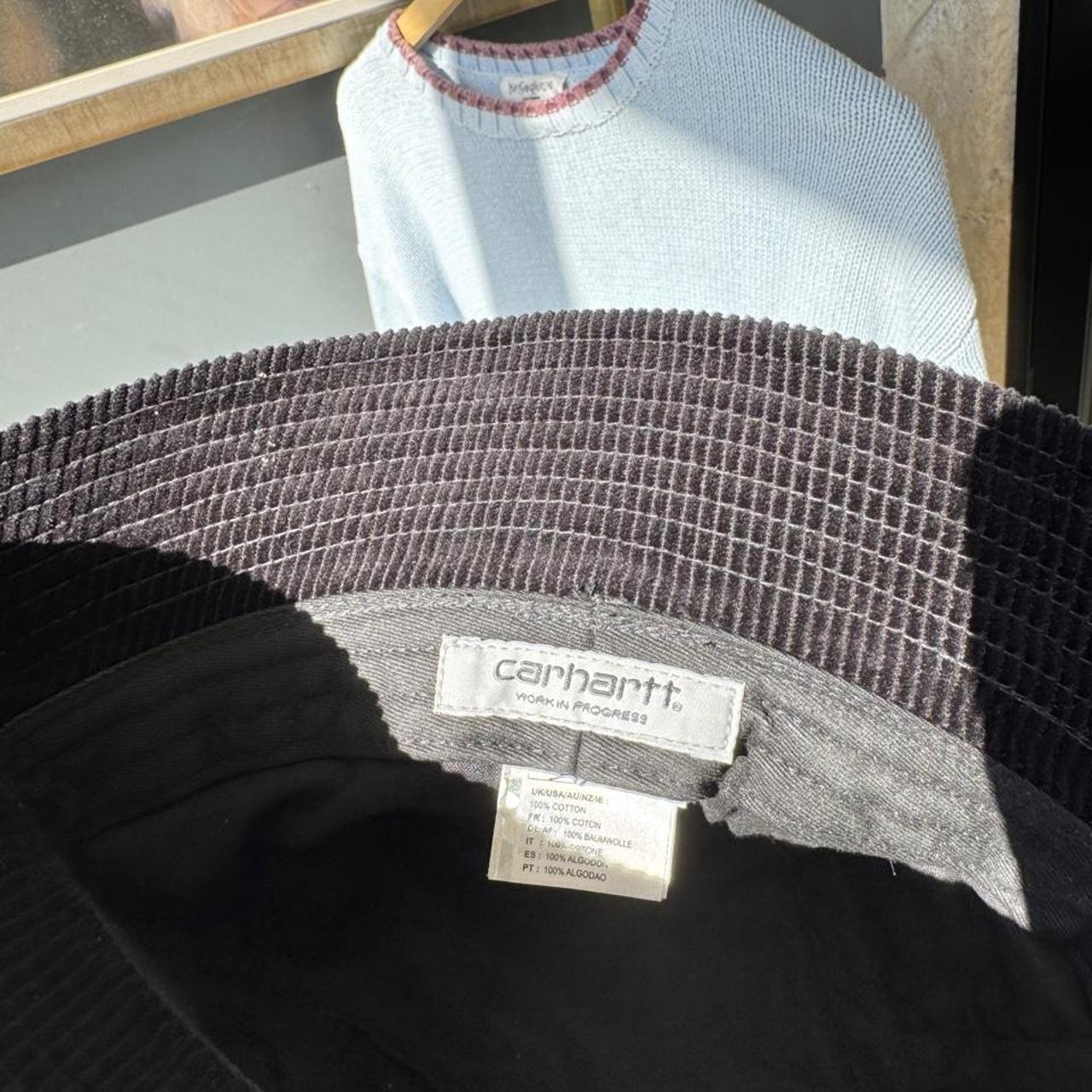 Carhartt WIP bucket hat brown corduroy with embroidered logo detail.