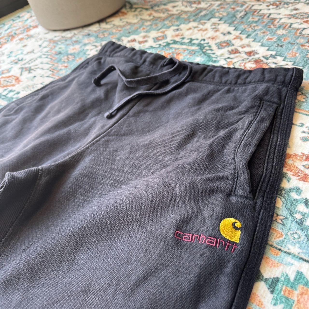 Carhartt WIP grey sweat pants with American Script logo, cotton material, size M.