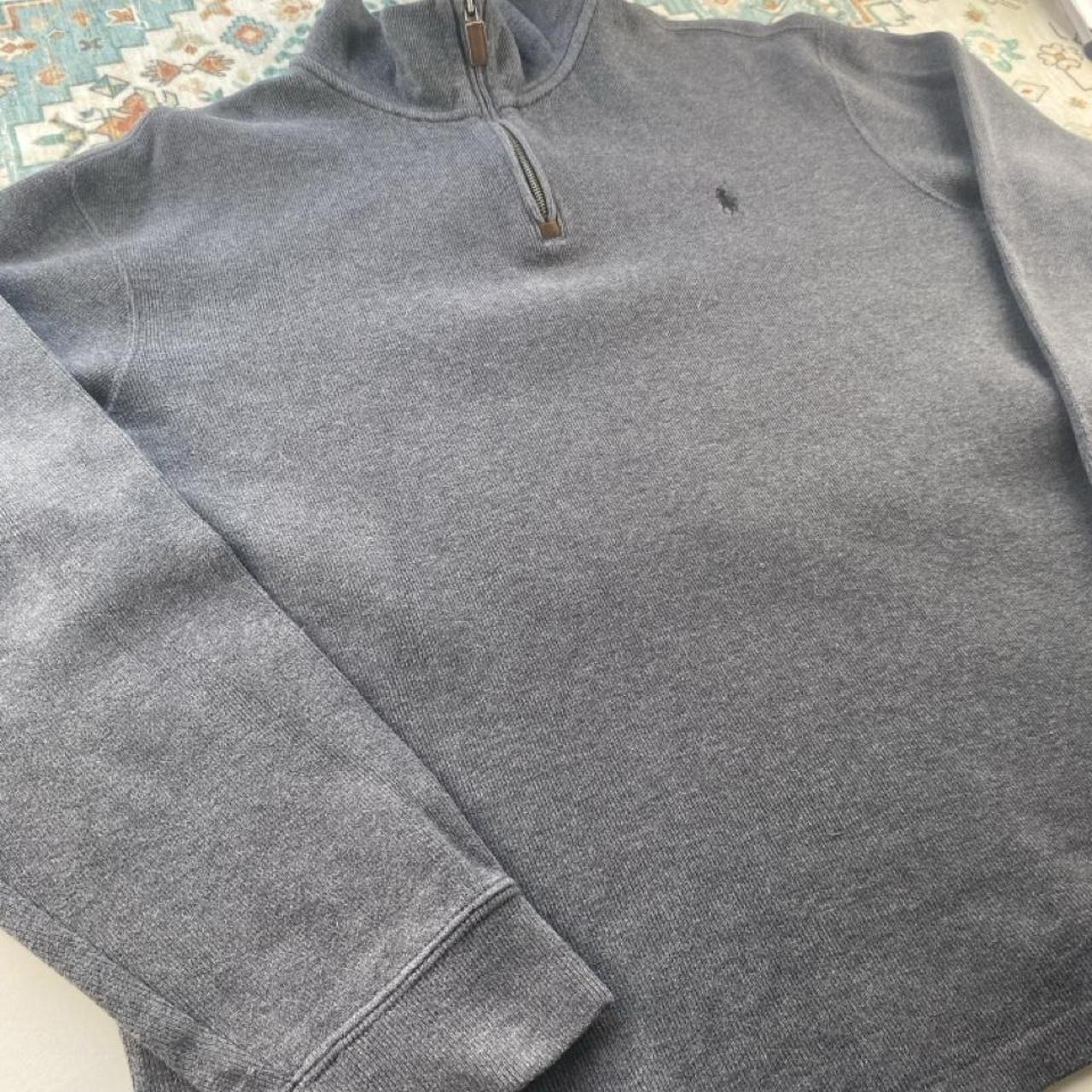 Polo Ralph Lauren grey quarter zip fleece with embroidered logo and soft material.