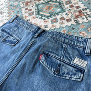 Levi's relaxed chino denim shorts in blue, featuring classic logo patch and clean design.