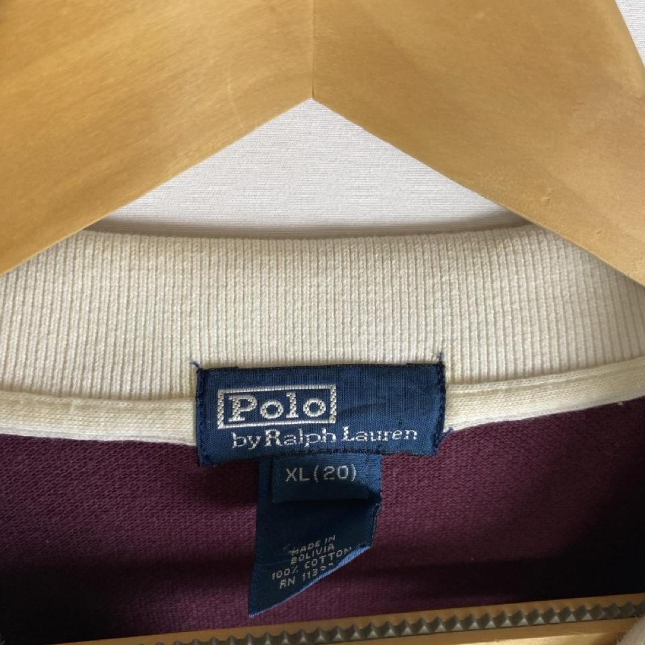 Polo Ralph Lauren burgundy rugby polo shirt with white stripes and embroidered logo.