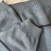 Burberry striped jumper small with embroidered logo and sun fading on shoulder.