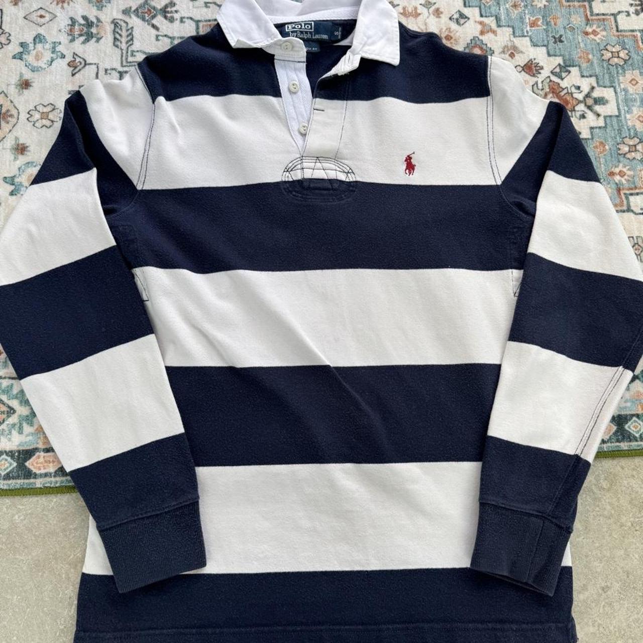 Polo Ralph Lauren navy rugby polo shirt with thick stripes and embroidered logo.