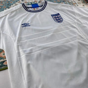 Umbro England home jersey, red with white logo and classic football design.