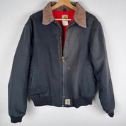 Carhartt cream jacket featuring thick fabric and oversized fit with Santa Fe design.