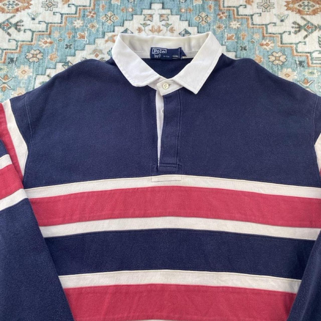 Polo Ralph Lauren oversized rugby polo, thick fabric, striped panels, classic logo.
