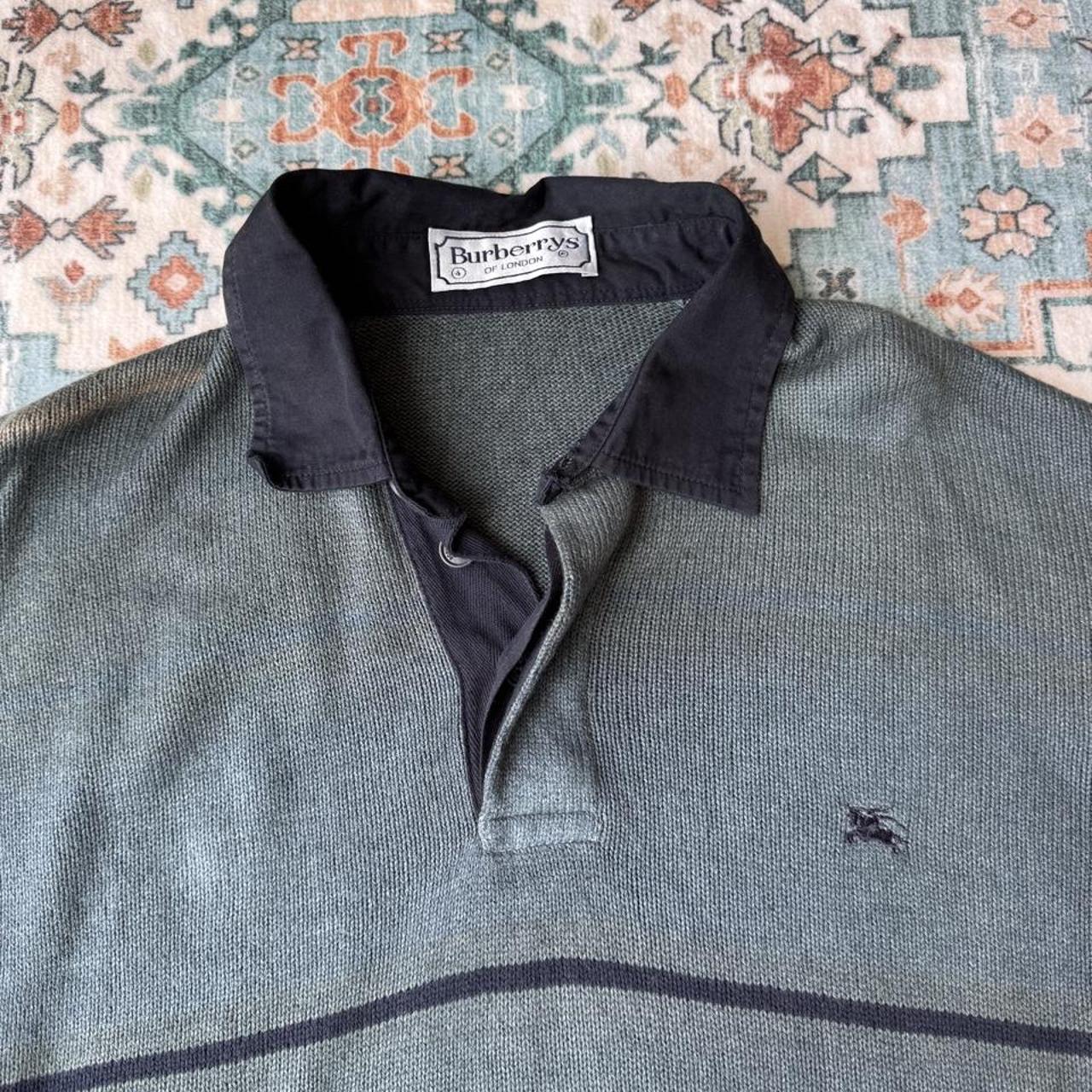 Burberry striped jumper small with embroidered logo and sun fading on shoulder.
