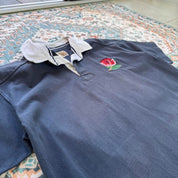 Cotton Traders men's polo shirt navy blue with England Rugby logo and white collar.
