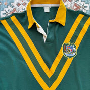 1990s Australia Wallabies rugby polo green with embroidered logo and classic collar.