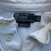 Polo Ralph Lauren white rugby polo shirt with embroidered logo and thick fabric.