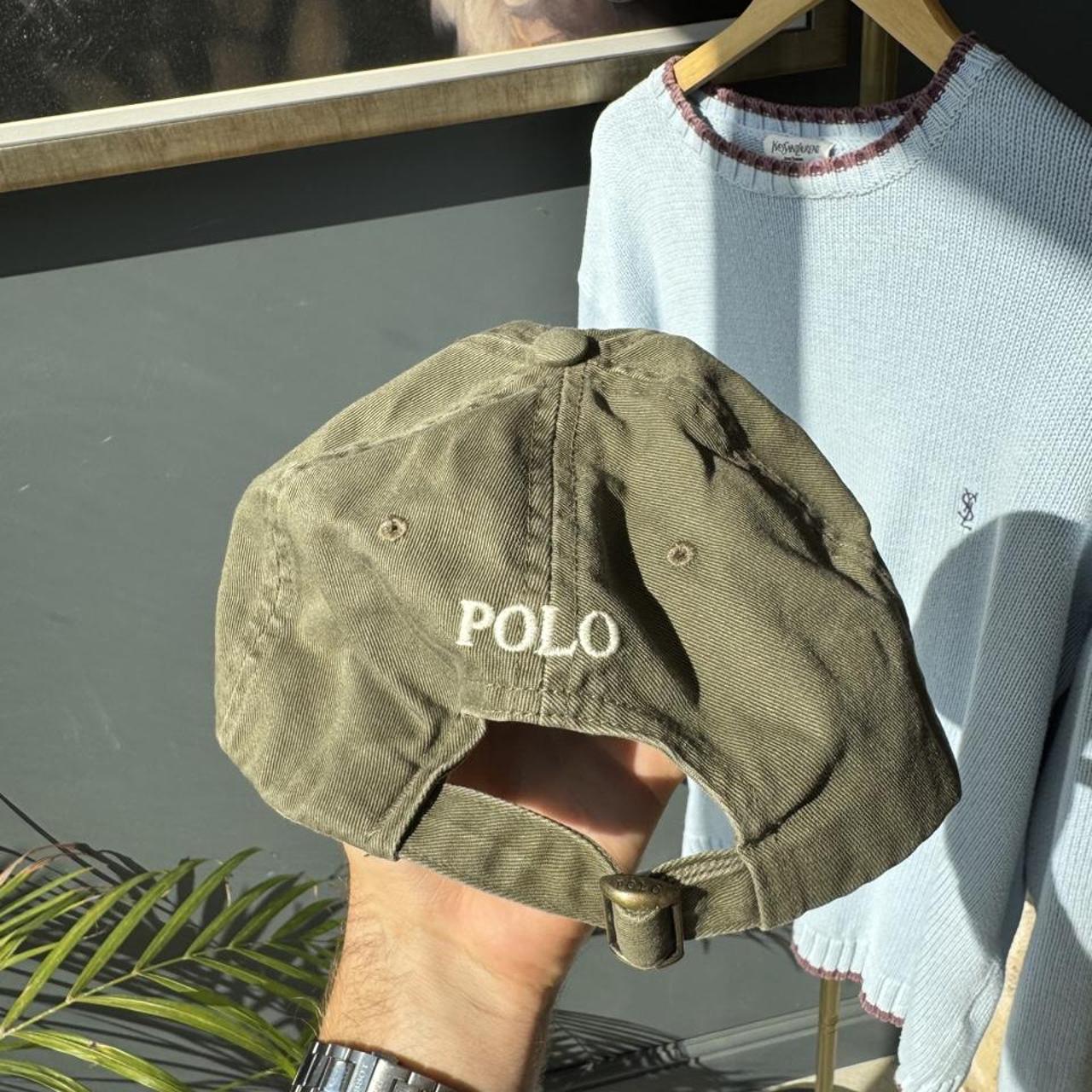 Polo Ralph Lauren khaki hat with embroidered logo and adjustable strap.