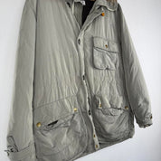 CP Company multi-colour utility parka jacket with multiple pockets and hood.