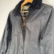 Barbour cream lightweight jacket with logo detail and slim fit design.