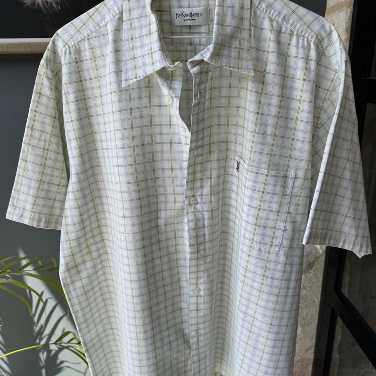 Yves Saint Laurent short sleeve button down shirt blue embroidered YSL logo detail.