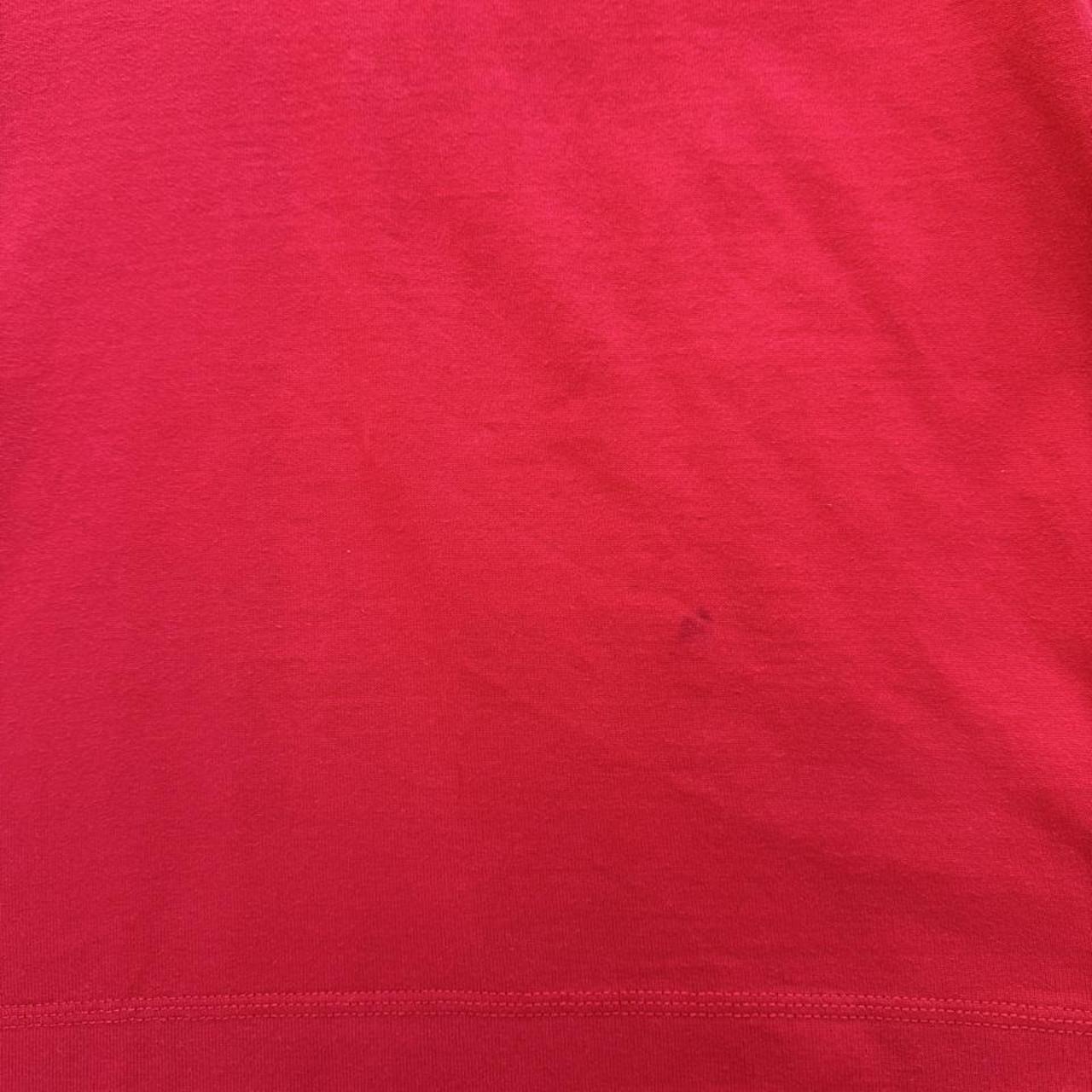 Canterbury men's rugby polo red with British and Irish Lions logo and embroidered details.