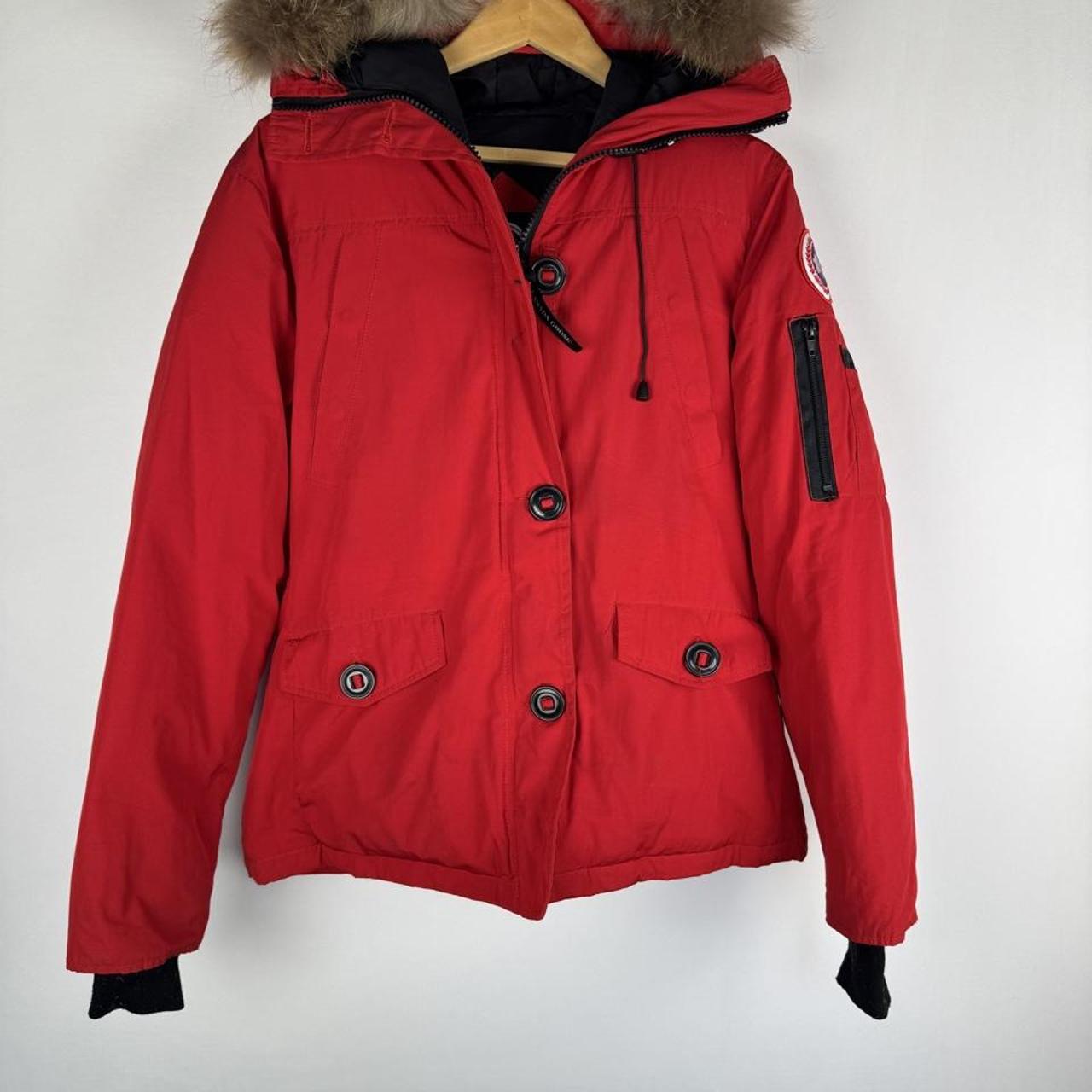 Canada Goose black Montebello parka jacket with fur-lined hood and logo patch.