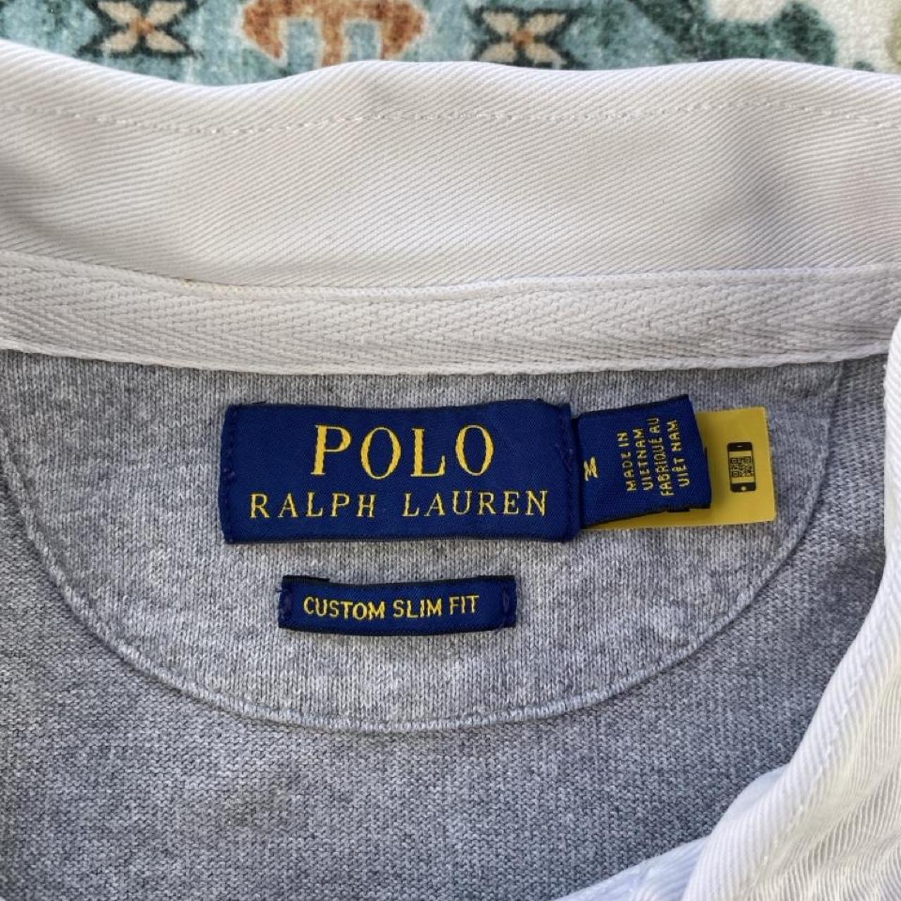 Polo Ralph Lauren grey rugby polo shirt with embroidered logo and classic collar.