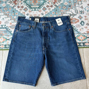 Levi's denim 501 shorts blue with classic logo patch and five-pocket design.