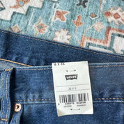 Levi's denim 501 shorts blue with classic logo patch and five-pocket design.