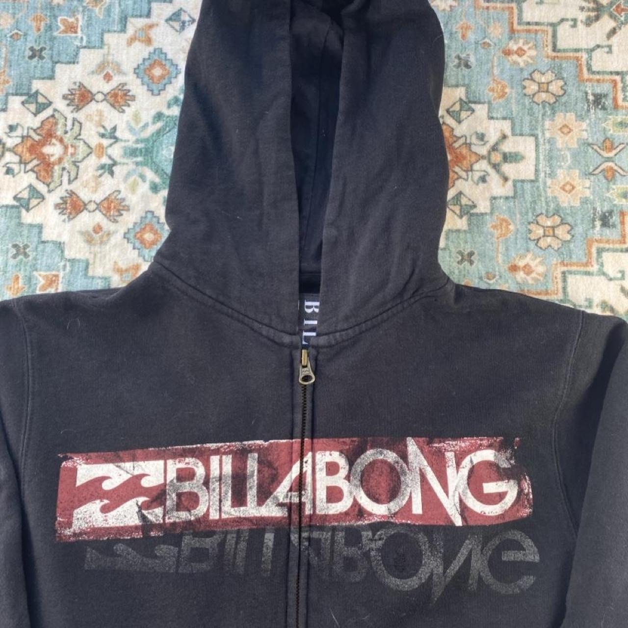 Billabong full zip hoodie for boys, navy blue, featuring logo and soft cotton material.