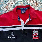 Kooga men's rugby polo shirt, navy blue, embroidered Dubai 7s logo, cotton material.