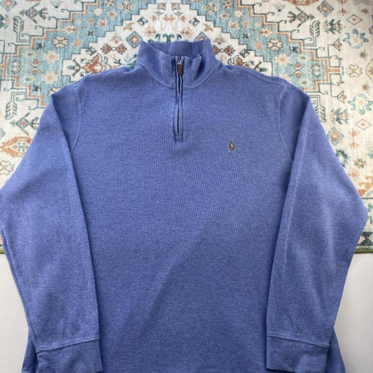 Polo Ralph Lauren light blue quarter zip fleece with embroidered logo and soft texture.