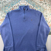 Polo Ralph Lauren light blue quarter zip fleece with embroidered logo and soft texture.