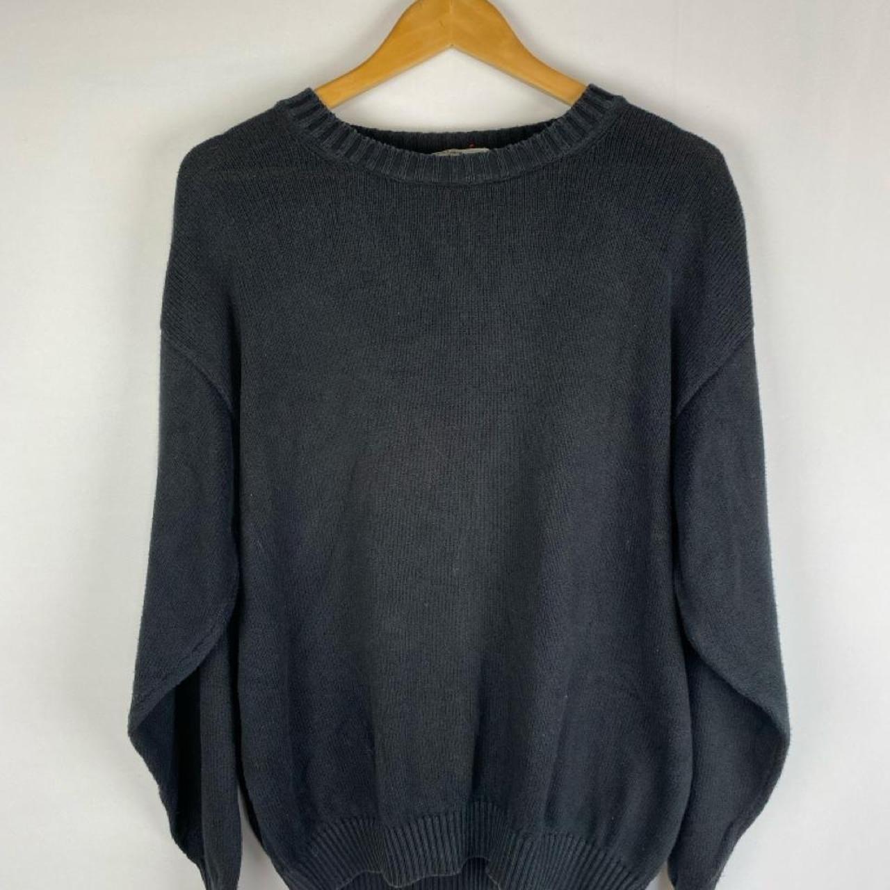 Yves Saint Laurent grey knitted jumper 1990s style with relaxed fit and ribbed texture.