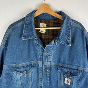 Carhartt denim trucker jacket 1990s style with classic logo and relaxed fit.