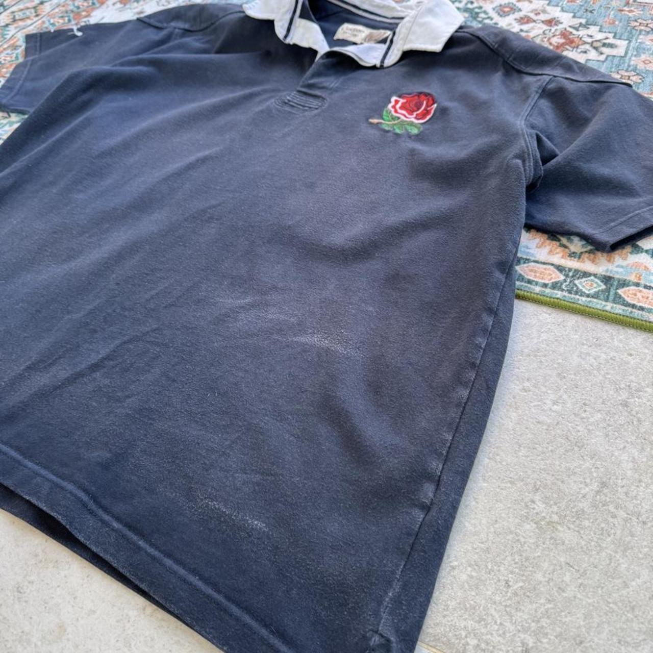 Cotton Traders men's polo shirt navy blue with England Rugby logo and white collar.
