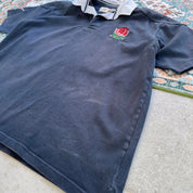 Cotton Traders men's polo shirt navy blue with England Rugby logo and white collar.