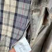 Barbour cream checkered parachute field jacket with relaxed fit and distinctive logo.
