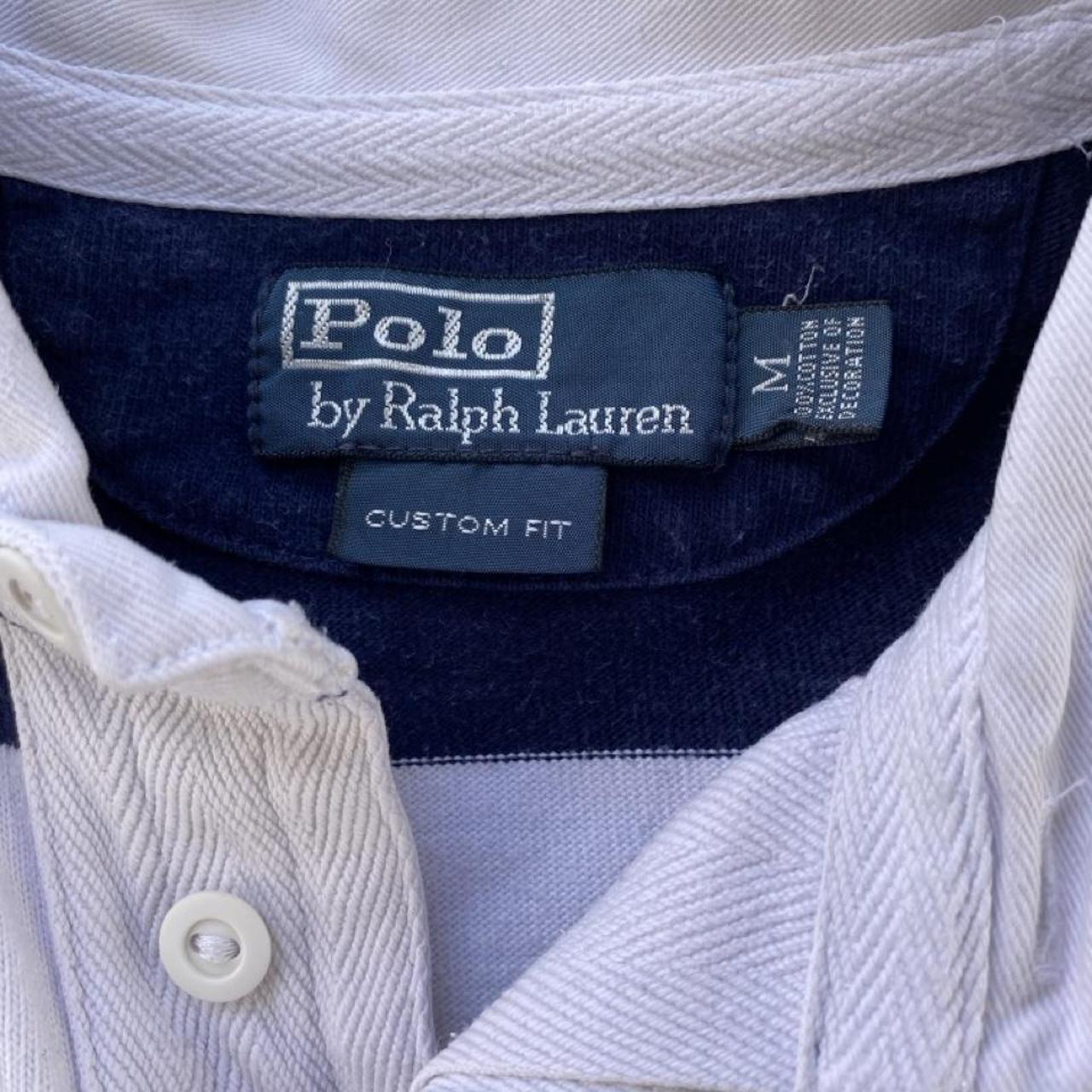 Polo Ralph Lauren navy striped rugby polo shirt with embroidered logo and thick cotton material.