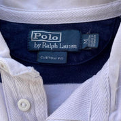 Polo Ralph Lauren navy striped rugby polo shirt with embroidered logo and thick cotton material.