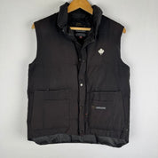 Canada Goose black down puffer gilet with logo patch and quilted texture.