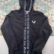 True Religion black and white full zip hoodie with logo and contrast stitching.