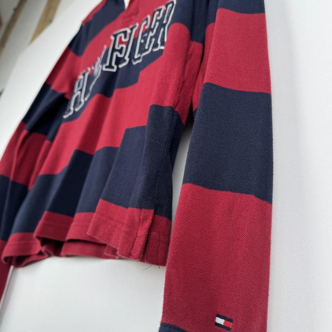 Tommy Hilfiger striped rugby polo shirt with embroidered spellout logo in navy and white.