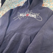 Billabong navy oversized hoodie with logo detail and soft material.