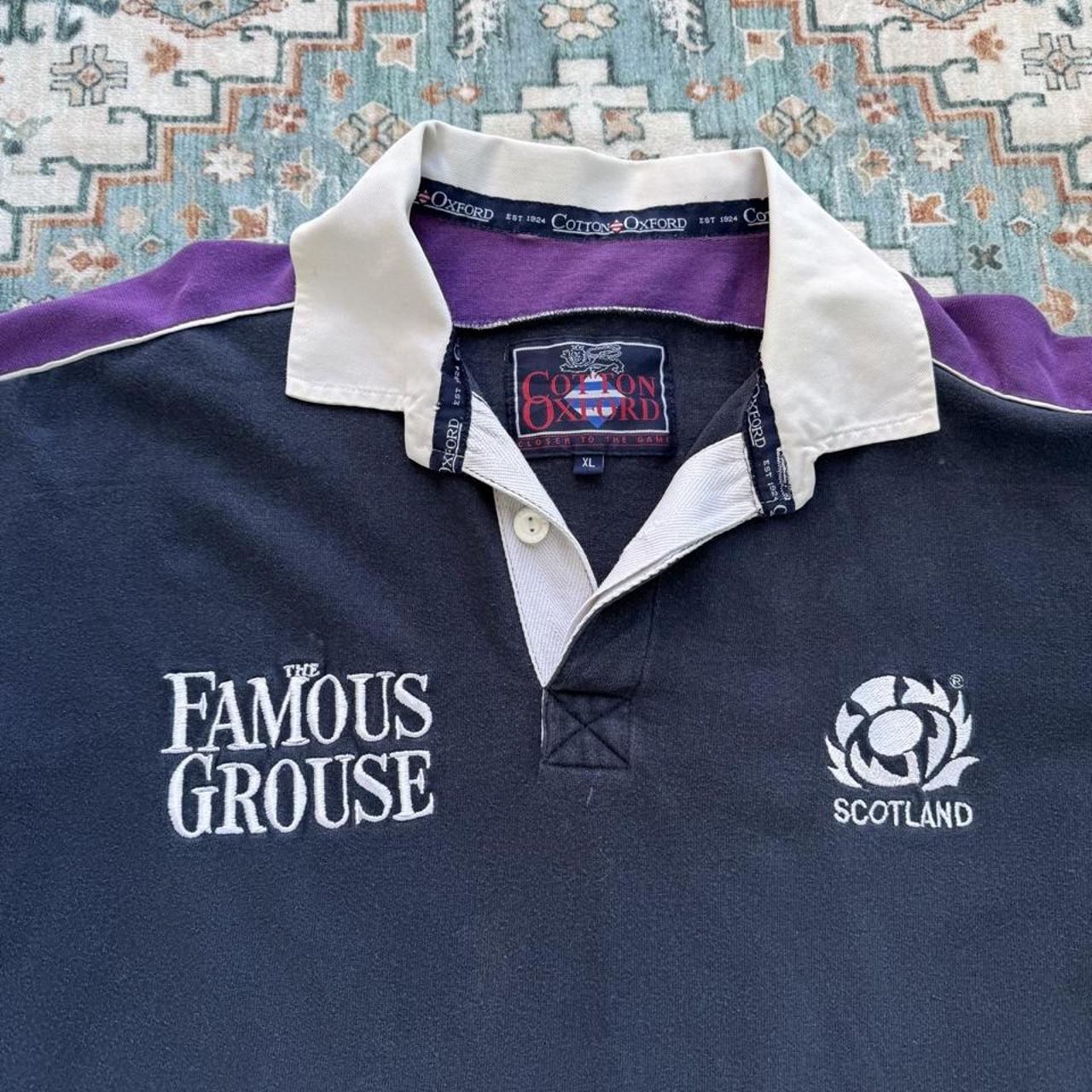 Cotton Traders men's polo shirt blue with Scotland rugby logo and cotton oxford material.