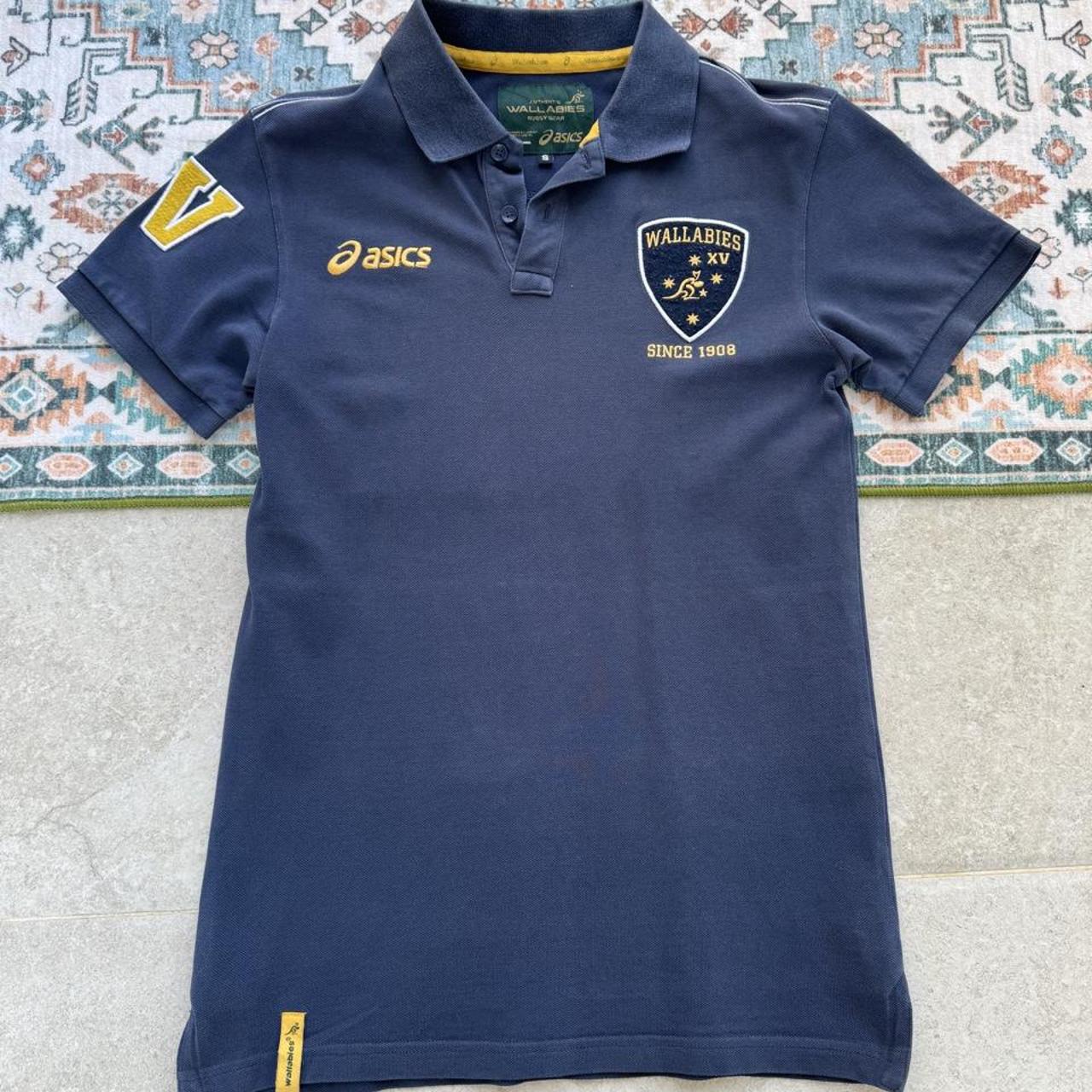 ASICS Wallabies rugby polo shirt green with logo and slim fit design.