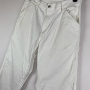 Carhartt WIP white corduroy carpenter trousers with single knee design and relaxed fit.