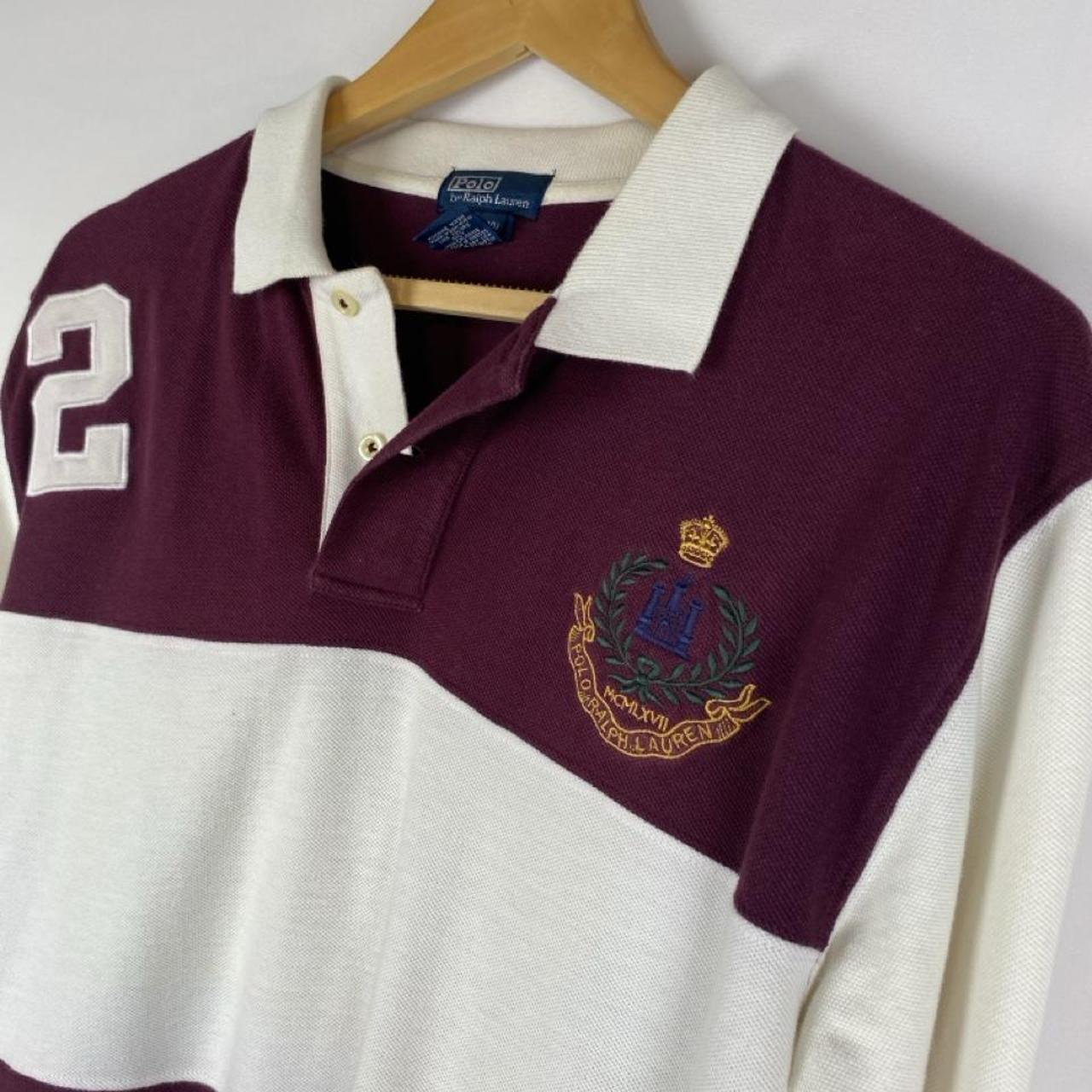 Polo Ralph Lauren burgundy rugby polo shirt with white stripes and embroidered logo.