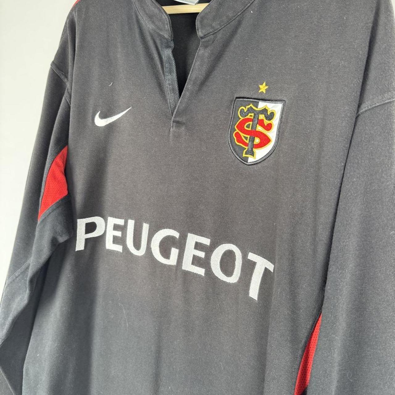 Nike men's rugby polo shirt red with Stade Toulousain logo and oversized fit.