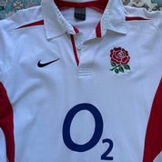 Nike long sleeve polo shirt in navy blue with embroidered England Rugby logo.