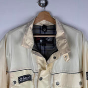 Belstaff cream motorcycle jacket with logo patch and shell material details.