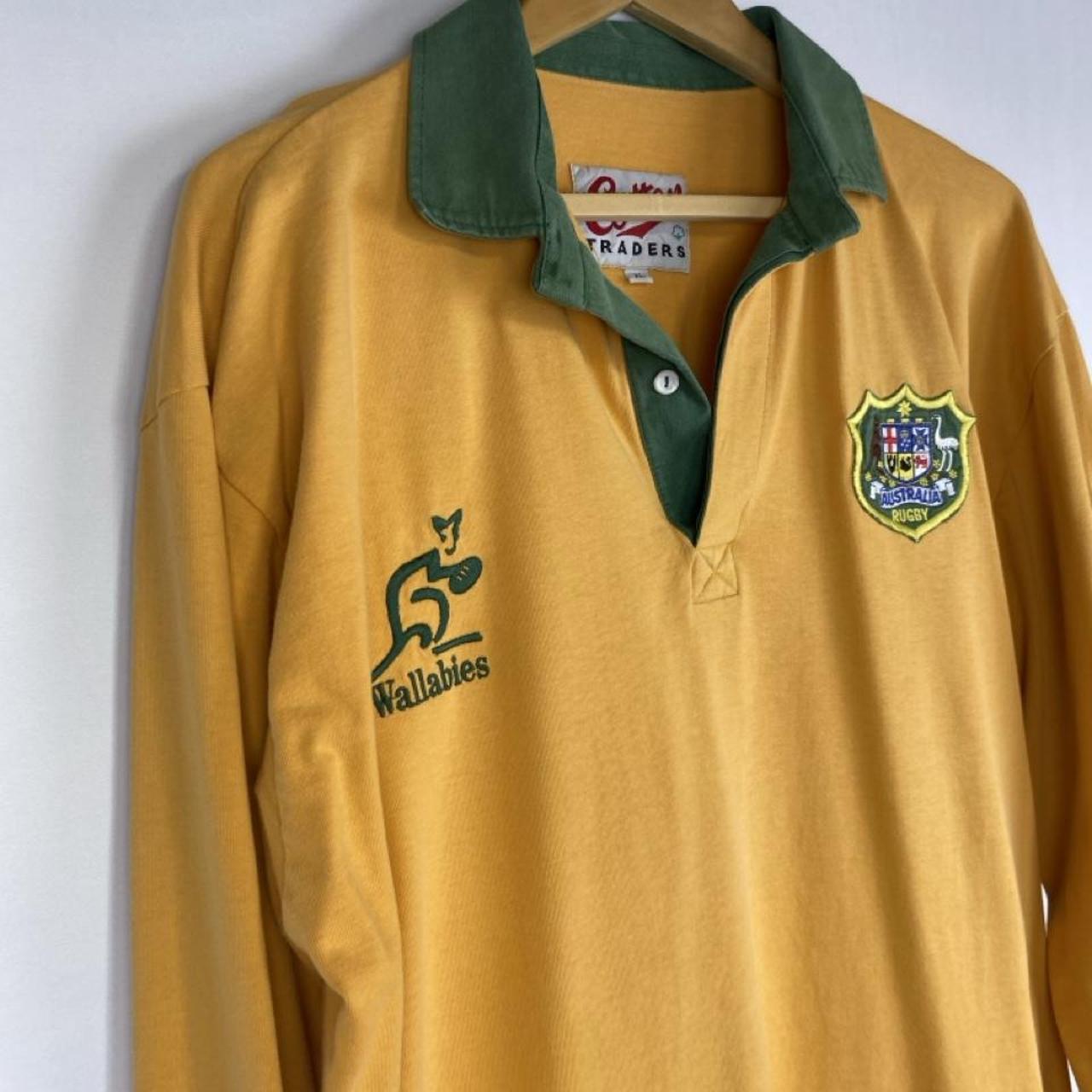 Cotton Traders green and yellow rugby polo with Wallabies logo and vintage design.