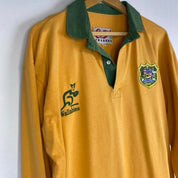 Cotton Traders green and yellow rugby polo with Wallabies logo and vintage design.