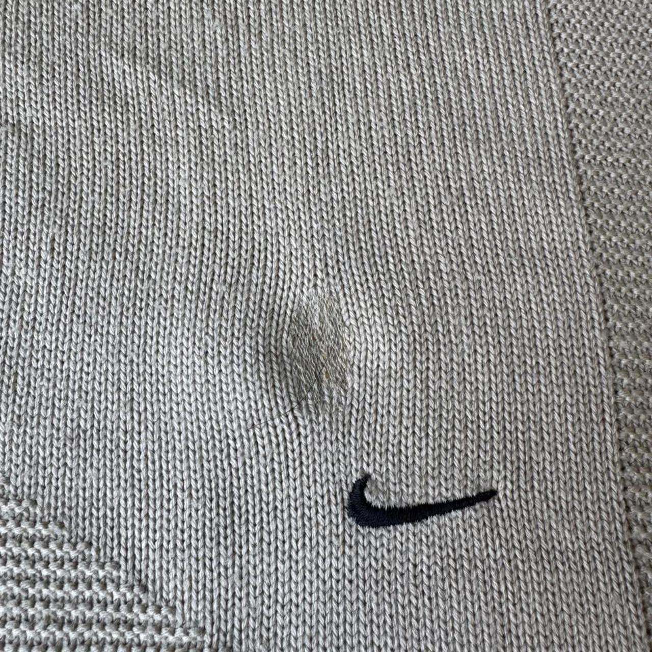 Nike cream knitted jumper with embroidered logo and visible marks from the 1990s.
