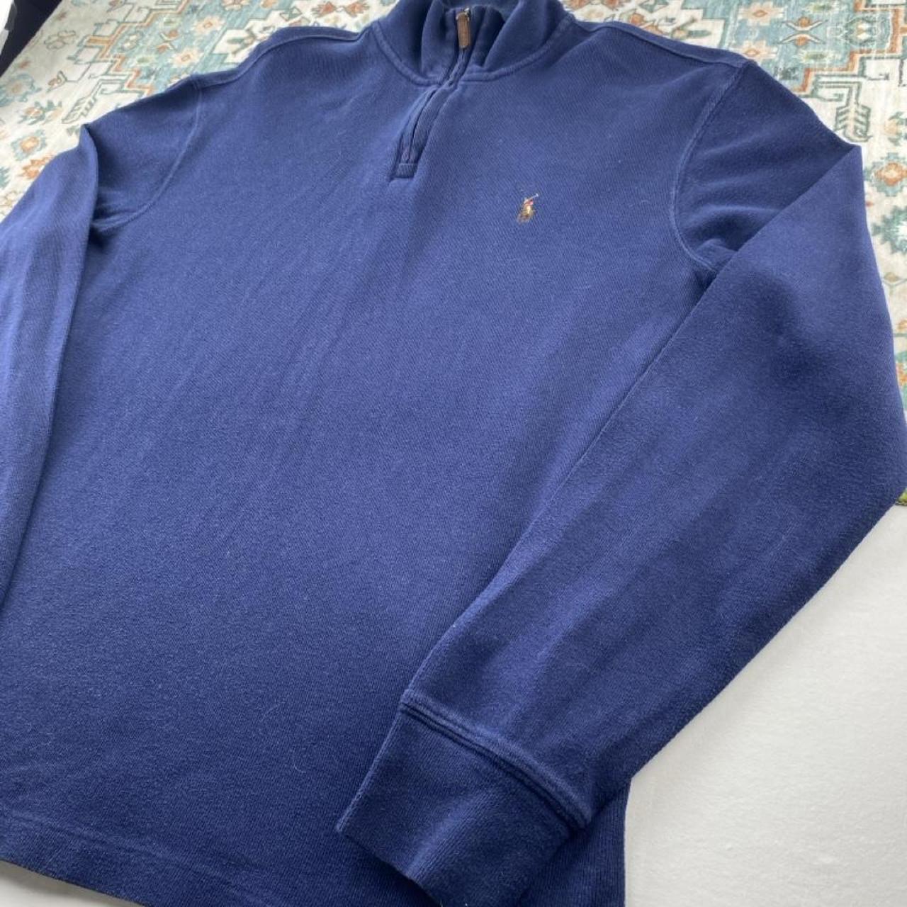 Polo Ralph Lauren navy jumper with embroidered pony logo and quarter zip design.