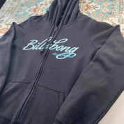 Billabong black oversized full zip hoodie with logo detail and soft material.